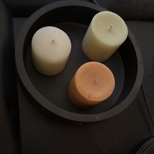3 candles with round wood holder
